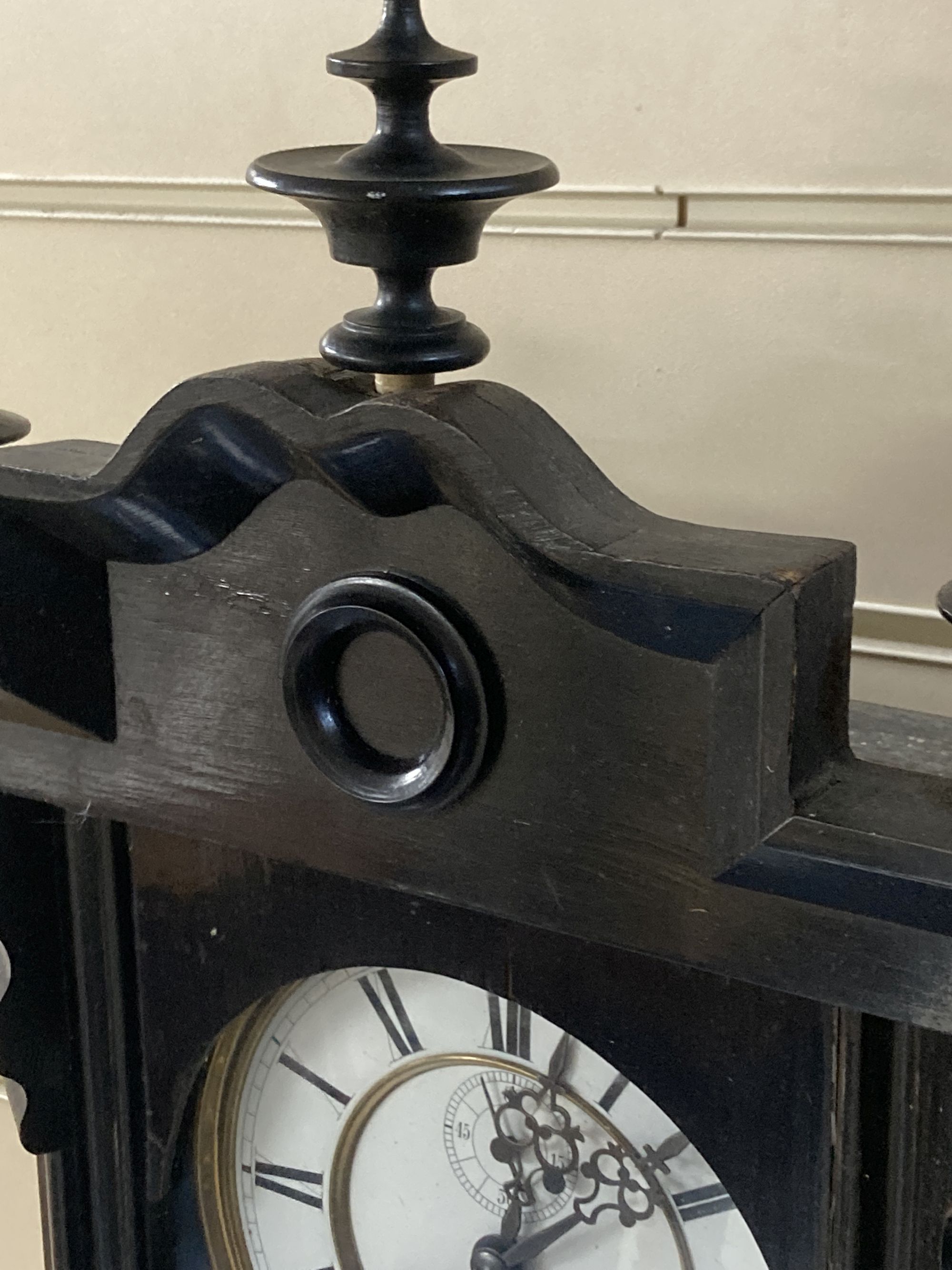 An early 20th century ebonised Vienna wall clock, height 106cm